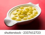 Small photo of Ambrosial Angoori Rasmalai: Juicy Saffron-infused Paneer Balls in Creamy Milk Syrup, Irresistible Indian Dessert for Food Photography and Culinary Themes.