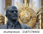 Small photo of Moscow, Russia 08 02 2019 Lenin close up with Communism logo fade out