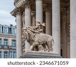 Statue at the entrance to the Brussels Stock Exchange, Belgium