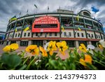 Small photo of Chicago, IL, USA - April 6 2022: MLB Opening Day 2022 at Chicago Cubs Wrigley Field Bleachers Entrance with Flowers