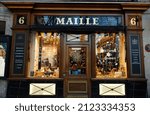 Small photo of Paris, France-February 07, 2022 : In the center of Paris, Place de la Madeleine, sits a beautiful Maille boutique. It offers bottles of beguiling mustards scale with distinctive flavors.