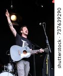 Small photo of Boomtown Fair Festival - August 13th 2017: British singer songwriter Frank Turner performing on stage at Boomtown Fair, Matterley Bowl, August 13, 2017, Winchester, Hampshire UK