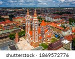 Szeged, Hungary - Aerial view of the Votive Church and Cathedral of Our Lady of Hungary (Szeged Dom) on a sunny summer day with blue sky and clouds