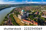 Small photo of Esztergom, Hungary - Aerial panoramic view of the Primatial Basilica of the Blessed Virgin Mary Assumed Into Heaven (Basilica of Esztergom) and city of Esztergom on a summer day with blue clouds