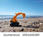 Yellow Bulldozer On The Beach...