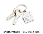 House keys with house shaped...