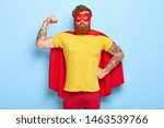 Self confident superhero shows biceps, fights evil and helps people, has great actions and achievements, pretends being heroic character, possesses supernatural power, wears mask and red cape