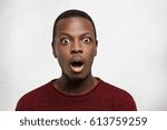 Are your serious? Isolated studio portrait of astonished bug-eyed young African American male dressed casually looking at camera with mouth fell opened and jaw dropped, can't believe shocking news