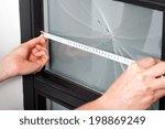 Measuring dimension of broken window before a repairing