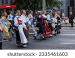 Small photo of Tallinn, Estonia - July 2, 2023: Estonian Song Festival (Estonian: Laulupidu) parade in Tallinn streets. Tallinn Mayor Mihhail Kolvart walking with members of the city government.