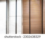 Small photo of Home blinds - cordless cellular honeycomb pleated shade automated curtains blind. Closeup photo, blurred.