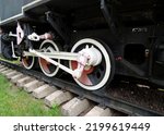 Small photo of Wheels Of Rare Steam Train On A Old Railway Sidetrack