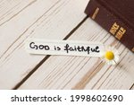 Small photo of God is faithful. Biblical concept about faithfulness, love, hope, truth. Trust Jesus Christ. Inspiring Bible quotes for mercy and grace.