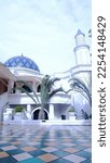 Small photo of Jakarta, Indonesia - January 23, 2023 : Al Bina mosque is strategically located in Senayan with easy access. This beautiful mosque is dominated by blue and the floors are covered in marble