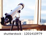 the telescope on the balcony, Telescope on the tripod, shallow depth of field