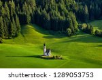 Amazing view of Chiesetta di San Giovanni in Ranui at sunset. Trentino Alto Adige, Dolomites mountains, South Tyrol, Italy, Europe. Kirche St. Johann in Ranui. Saint John Church.
