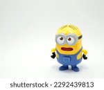 Small photo of Minions Stuart. Main minion of the movies. Character from the famous Despicable Me movies. Isolated white.