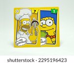 Small photo of The Simpsons. Homer and Marge Simpson. Playing card with the image of the characters from the animated series created by cartoonist Matt Groening. Cartoon. Parents of Bart, Lisa and Maggi