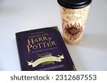 Small photo of Cookbook with Harry Potter by Dinah Bucholz. The unofficial cookbook of movie and books. Marauder's Map Tumbler. Glass from the movie and books by J. K. Rowling. Hogwarts school.