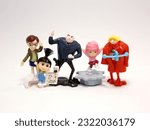 Small photo of Gru with his daughters Agnes, Edith and Margo and with his brother Dru. Minions. Gru. Villain Gru. Family of Gru. Characters from the famous Despicable Me 3 movie. Kinder Egg Toys.