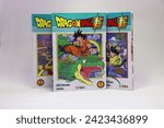 Small photo of 02-07-2024, C´ordoba, Argentina. Dragon Ball Super manga books on isolated white background. Copy Space. Japanese anime comic books for children with the characters of Goku, Vegeta and their friends.