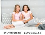 Small photo of Soulmates girls having fun sleepover party. Childhood friendship concept. Girls happy best friends sleepover domestic party. Sleepover time for fun gossip story. Best girls sleepover party ideas.