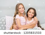 Small photo of Best girls sleepover party ideas. Soulmates girls having fun sleepover party. Childhood friendship concept. Girls happy best friends sleepover domestic party. Sleepover time for fun gossip story.