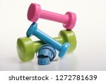 dumbbells near blue rolled... | Shutterstock . vector #1272781639