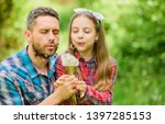 Small photo of Dad and daughter collecting dandelion flowers. Keep allergies from ruining your life. Seasonal allergies concept. Outgrow allergies. Happy family vacation. Father and little girl enjoy summertime.