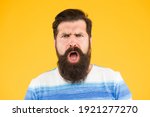 Small photo of Outrageous. Stress resistance concept. Guy tense face expression. Outraged expression. Feel catch. Emotional bearded man. Emotional wellbeing. Mental health. Psychology concept. Emotional intellect.