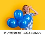 party girl with balloon in sunglasses. happy girl hold party balloons in studio. girl with balloon