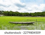 landscape with rowboat at riverside. photo of rowboat at riverside. rowboat at riverside nature.