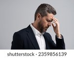 Small photo of Businessman feel stressed. Stressful businessman. Overworked man business manager. Overworked man feeling migraine head strain. Stressed, tired man with headache. Stress and headache. Office Stress