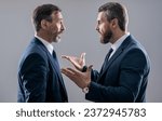 Small photo of men having conflict. threatening business reputation. rival company threatening. businessmen threaten business men isolated on grey. businessmen threaten business model