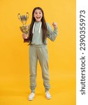 Small photo of sport success and victory. teen girl holding champion cup. girl winner in sport. successful sport and childhood of teen. being true champion. celebrating success. teen girl champion. Champion glory