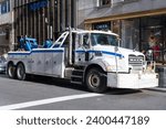 Small photo of New York City, USA - November 11, 2023: MTA Mack Granite Traffic Tow Truck, side view