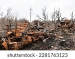 Small photo of The site of the battle near the town of Izyum in the Kharkiv region. Burnt-out military equipment and mangled burnt trees can be seen.
