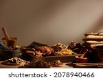 Traditional chinese medicine with herb and spices in light a grey background , for medicine advertising , photography traditional medicine content