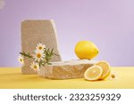 Small photo of Scene for advertising cosmetic of lemon extract with space on stone podium, lemon and flower on purple background. The vitamins, fiber, and plant compounds in lemons can be part of a healthy diet