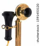 Small photo of Antique brass candlestick telephone made around 1910.