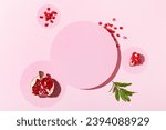 Small photo of Top view cosmetic background for product presentation with pomegranate extract. Empty Cosmetic circle podium and pomegranate extract on light pink background. Flat lay