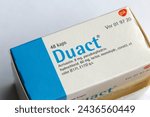 Small photo of Espoo, Finland - April 2020: Duact capsule package, a prescription medication with acrivastine and pseudo ephedrine. Used for pollen allergy and seasonal allergies during spring and summer. Closeup.