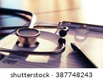 cardiologist stethoscope paper insurance