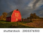 A Rustic Barn Illuminated By A...