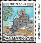 Small photo of Milan, Italy - May 20, 2020: Niels Bohr and his wife on postage stamp