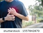 Exhausted runner suffering heart, maybe he got overtrain or heart attack