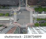 Small photo of An intersection or an at-grade junction is a junction where two or more roads converge, diverge, meet or cross at the same road.