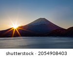 Small photo of Mount Fuji with sun rising on Lake Motosu.