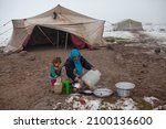 Small photo of Syria - October 2017: Syrian refugees in the Syrian border region are struggling to survive in cold weather conditions.