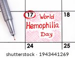 Small photo of Reminder World Hemophilia Day in calendar with pen. April 17